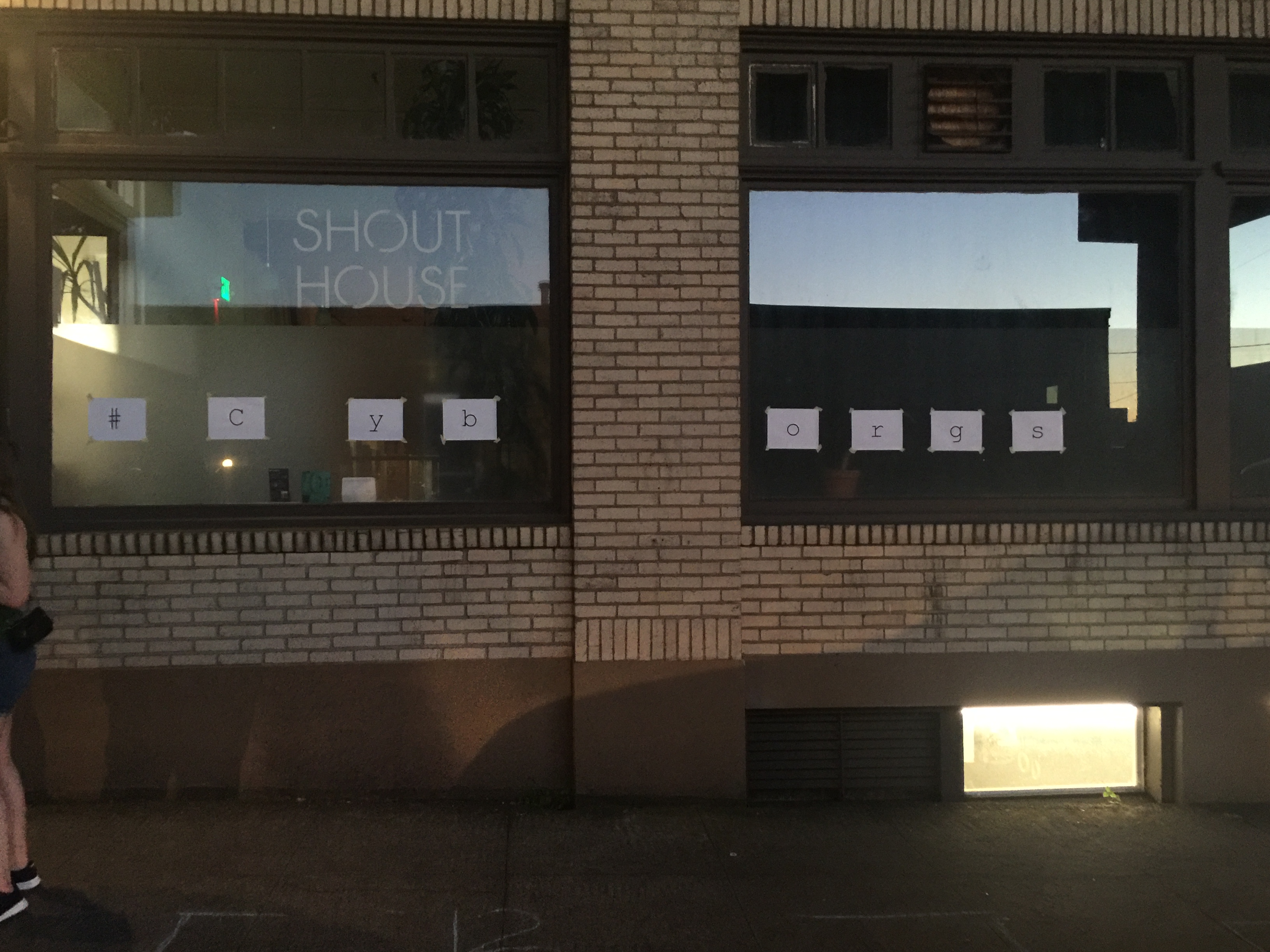 SHOUT HOUSE storefront with #cyborgs letters in the windows, First Friday pop-up — exterior
